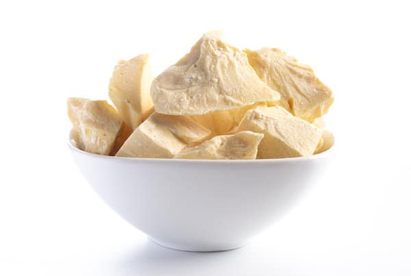 Raw Cocoa Butter in a White Bowl