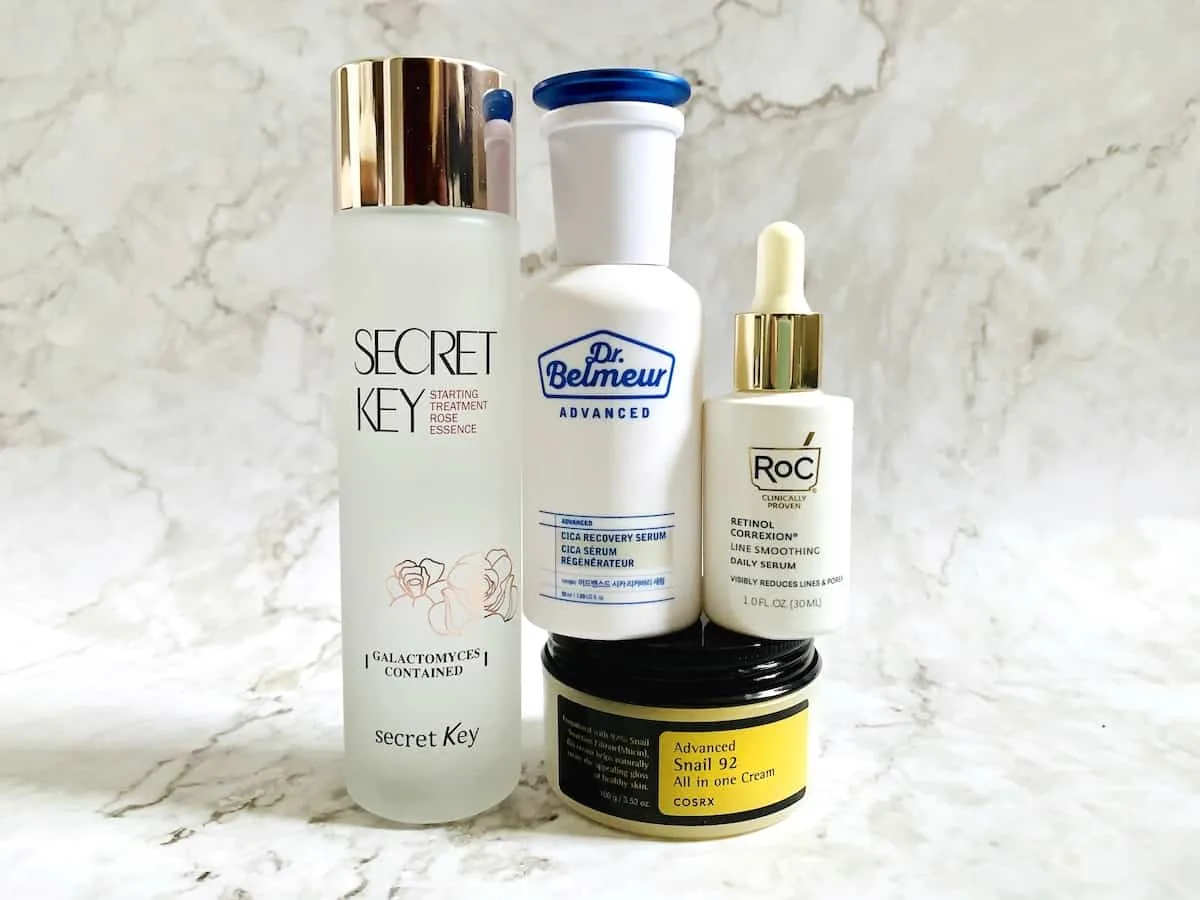 Secret Key Starting Treatment Essence - Rose Edition, Dr Belmeur Advanced Cica Recovery Serum, RoC Retinol Correxion Line Smoothing Daily Serum, and Cosrx Advanced Snail 92 All-In-One Cream