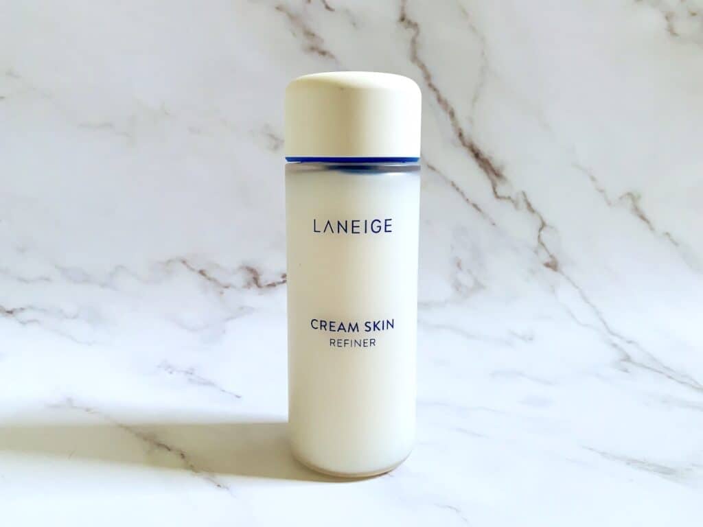 Laneige Cream Skin Refiner on marble background