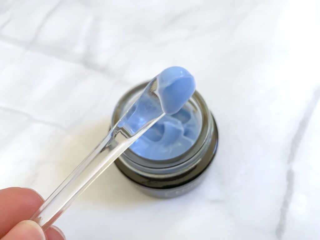 Klairs Midnight Blue Calming Cream sampled on clear plastic spatula.