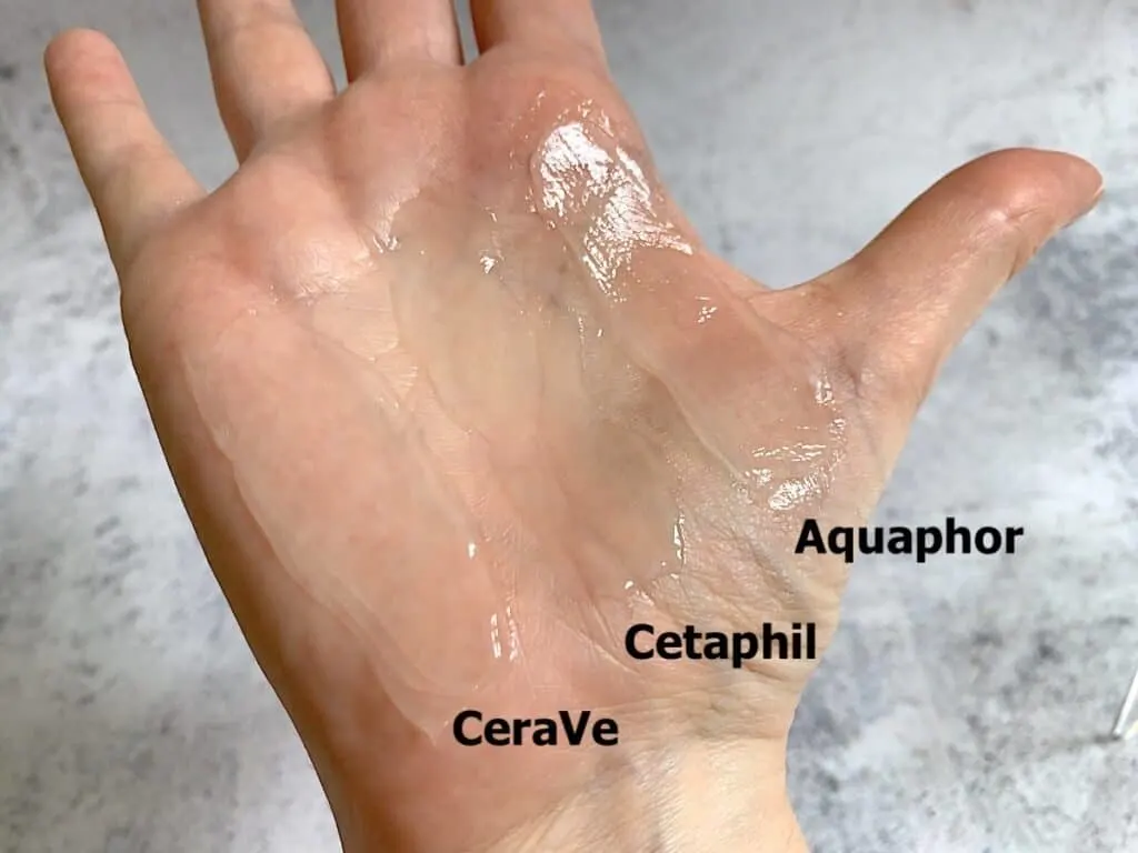 CeraVe Healing Ointment, Cetaphil Healing Ointment and Aquaphor Healing Ointment sampled and palm of hand.